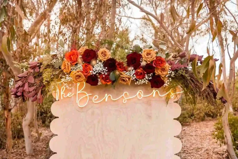 Floral wedding sign with neon lettering
